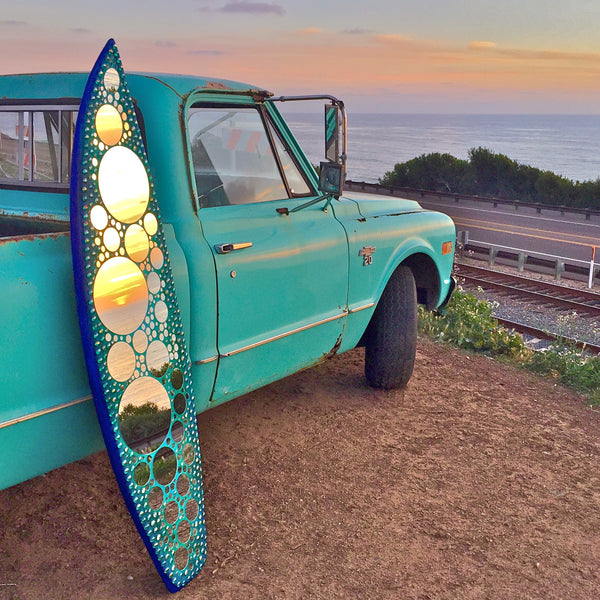 Mirror Mosaic Surfboard Art at Sunset